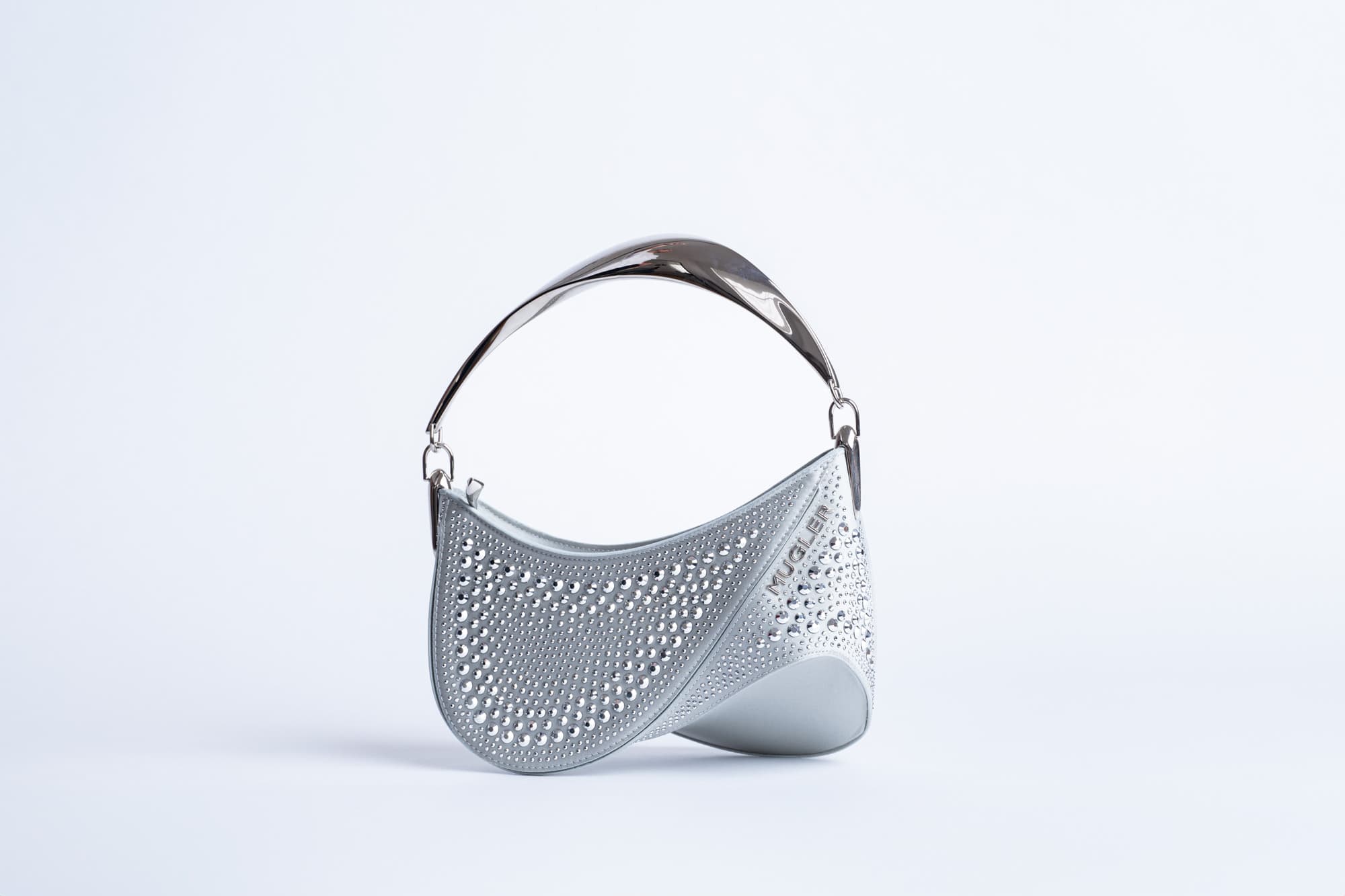 Location et vente de vêtements et sacs à main de luxe chez Yvette Showroom